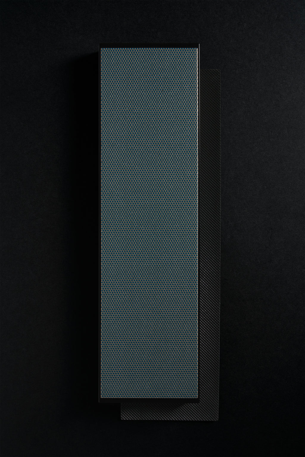 Extra-large Zen-Wu diamond flattening stone, full face on a dark background