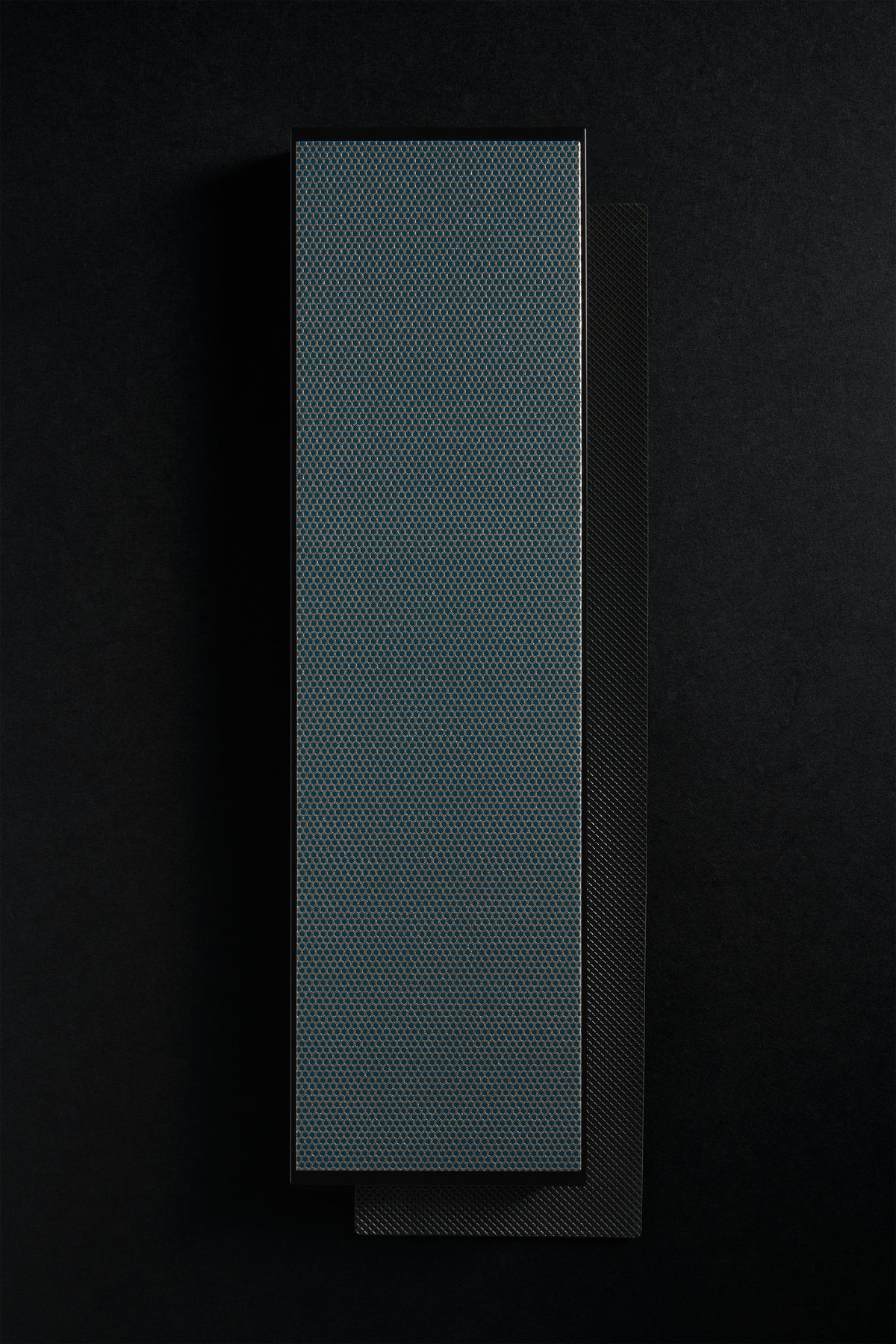Extra-large Zen-Wu diamond flattening stone, full face on a dark background