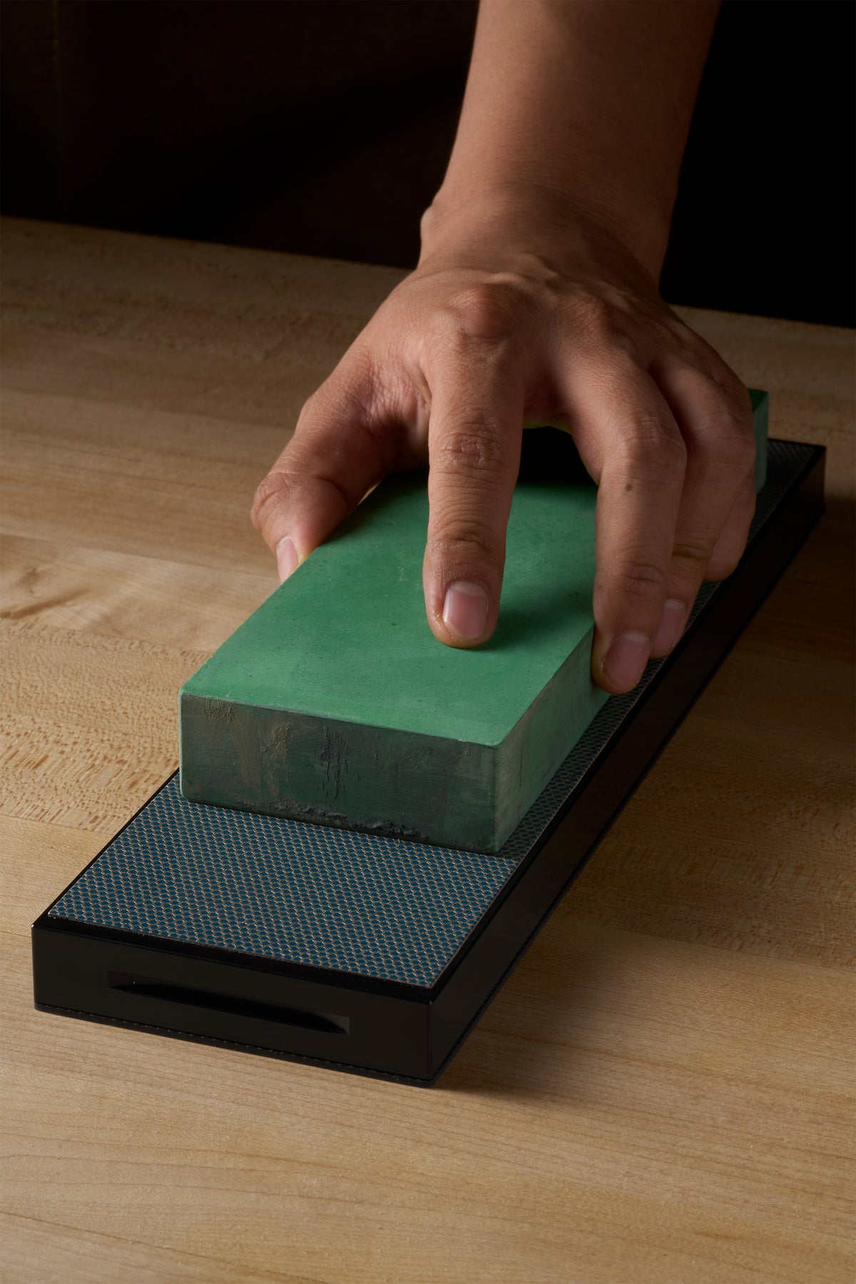 Flattening a green waterstone on a Zen-Wu diamond flattening stone