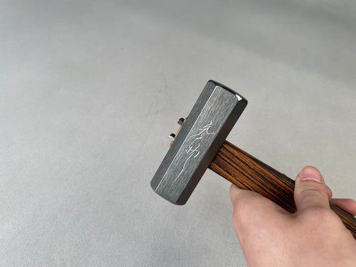 F-2 hammer (grain direction), photographed on the bench