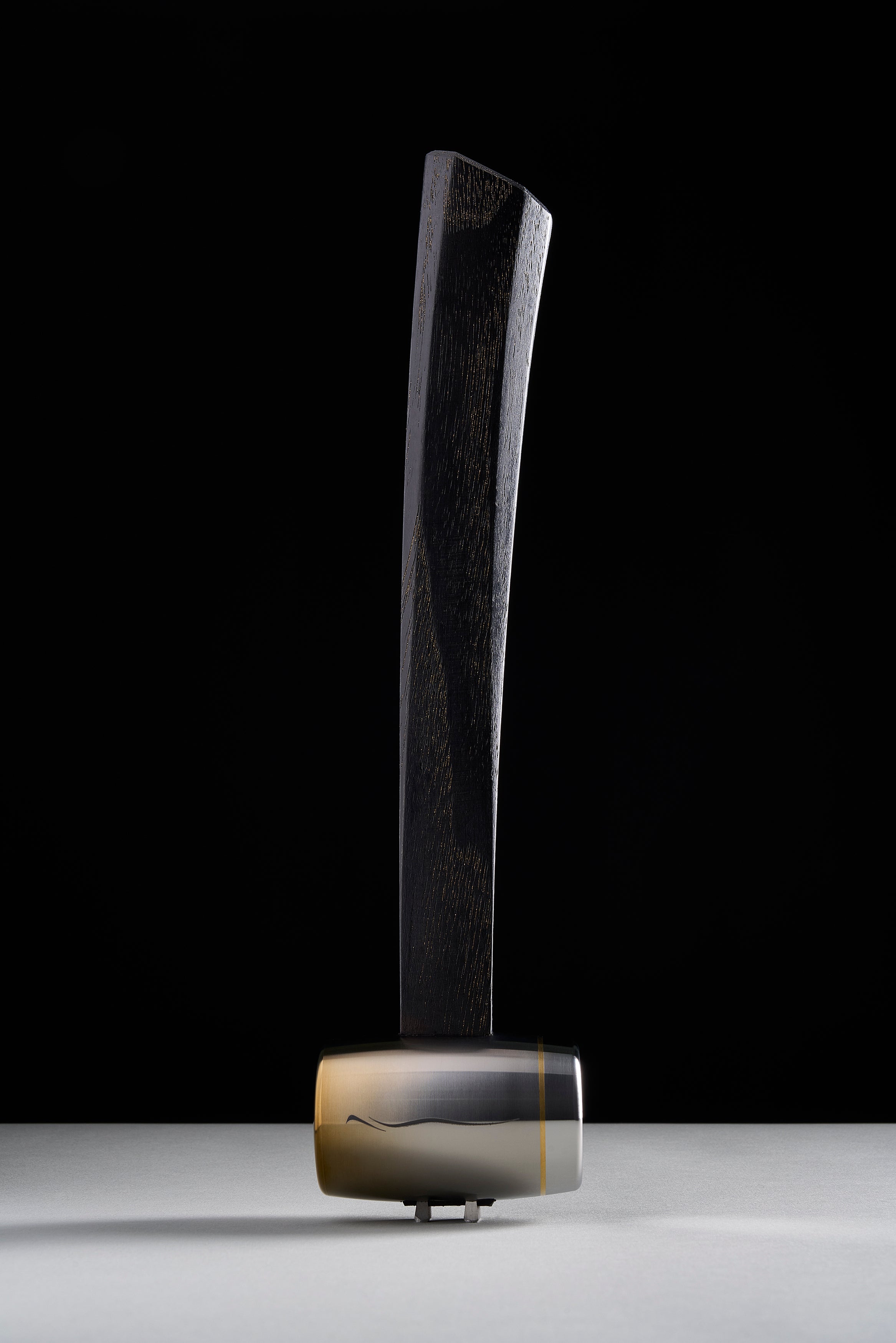 F-4 hammer in brushed titanium with brass ring at the face seam, curved dyed hickory handle