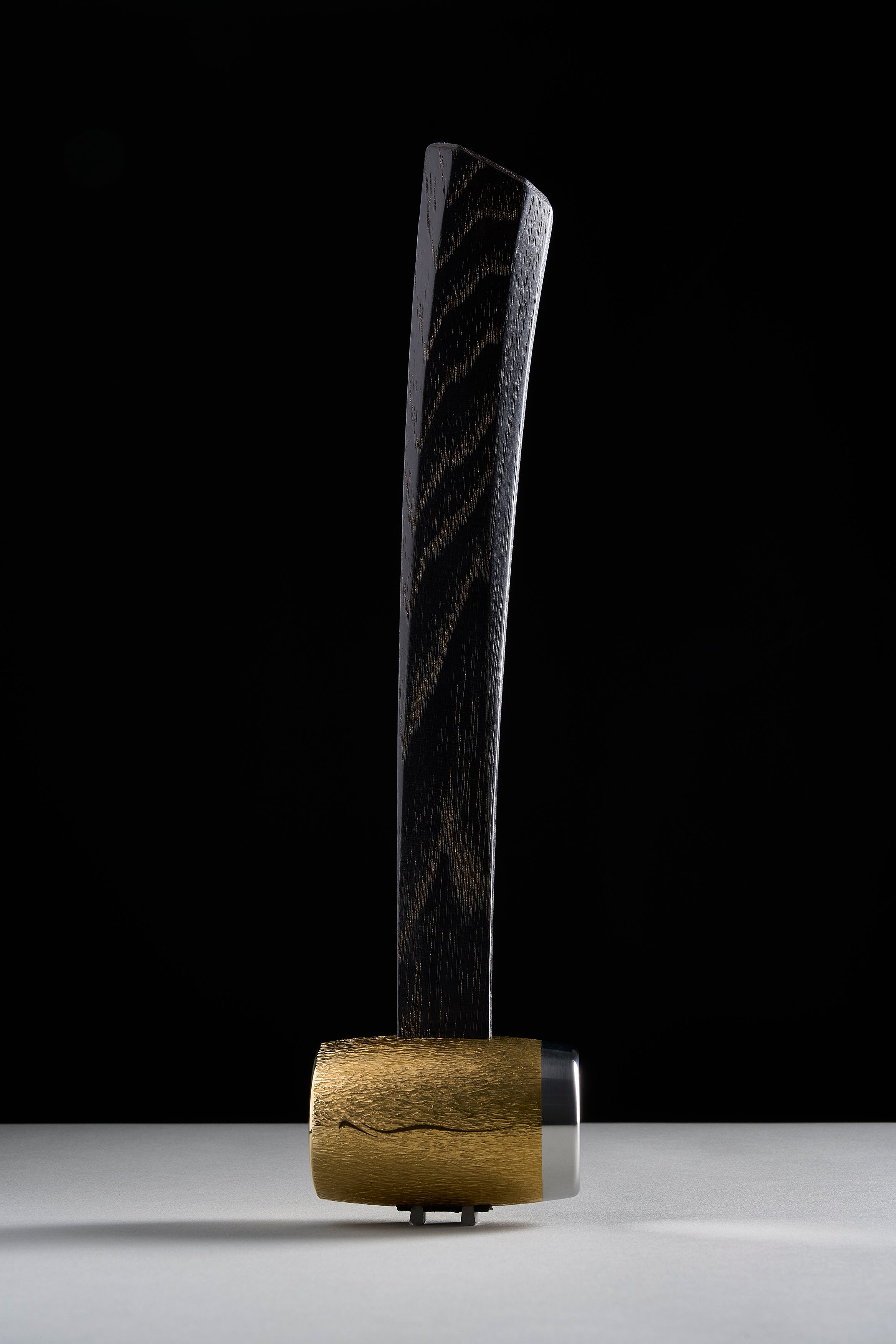 F-4 hammer with hand-carved brass head, bright steel face band, dyed hickory handle
