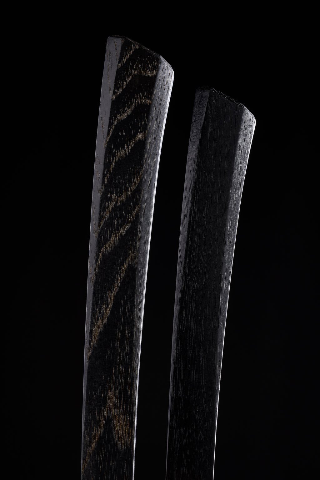 Two F-4 dyed hickory handles, grain showing through the black