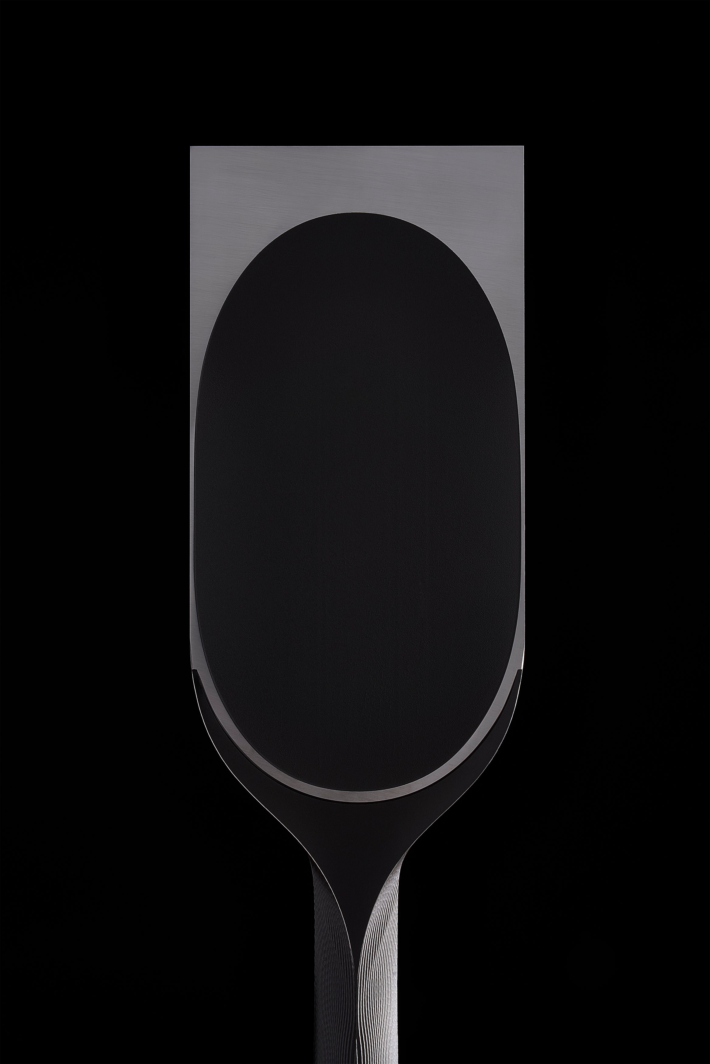 Back of the wide DC-1 blade, one long oval hollow inside a polished land