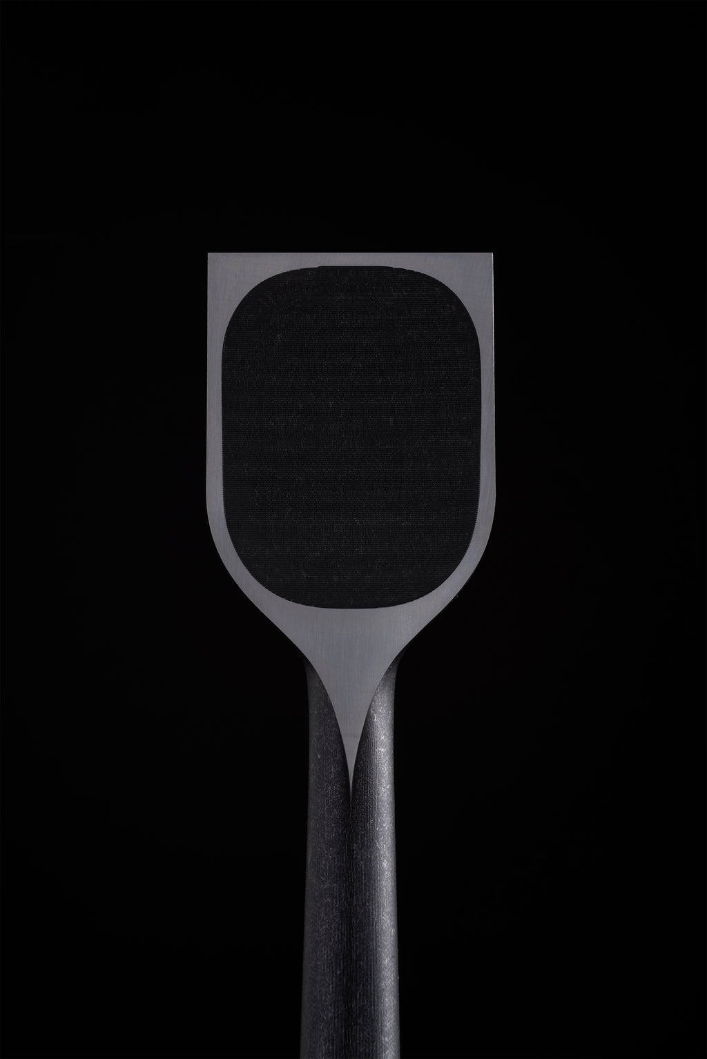 Hollowed back of a wide TB-1 chisel, flat land around the polished edge