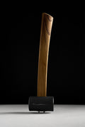 Zen-Wu F-3 hammer standing on its head, handle upright, against a dark background